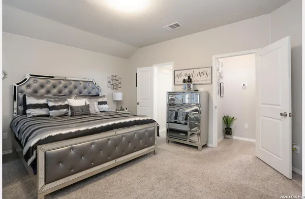 a view of bedroom with furniture