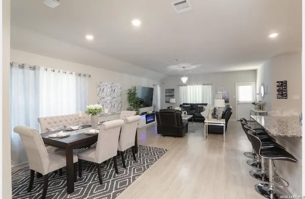 a view of a dining room with furniture