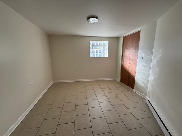 a view of empty room with windows