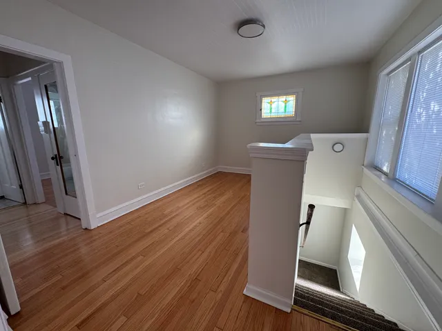 wooden floor and window in a room