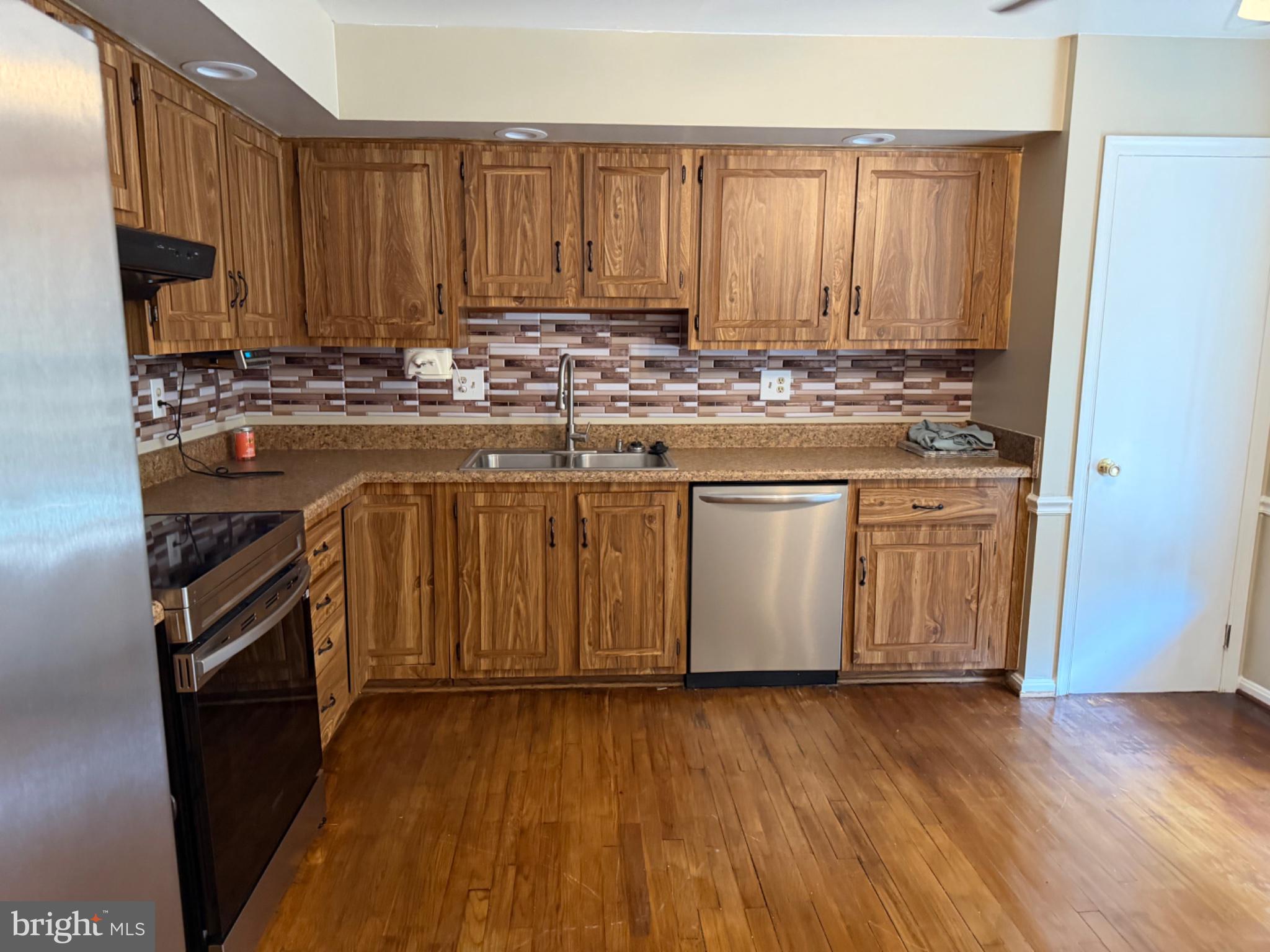 2861 Ridge Road Waldorf, MD 20603 - Photo 24 of 49 Warm wood tones in a cozy kitchen.