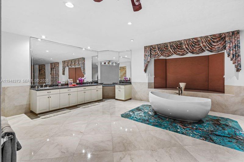 18455 Southwest 284th Street Homestead, FL 33030 - Photo 13 of 15 a living room with furniture and kitchen view