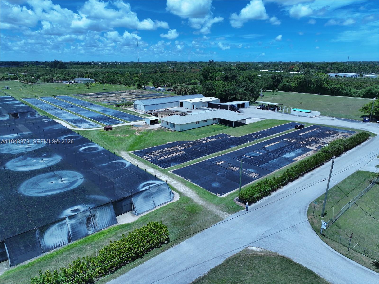 18455 Southwest 284th Street Homestead, FL 33030 - Photo 2 of 15 an outdoor space with furniture