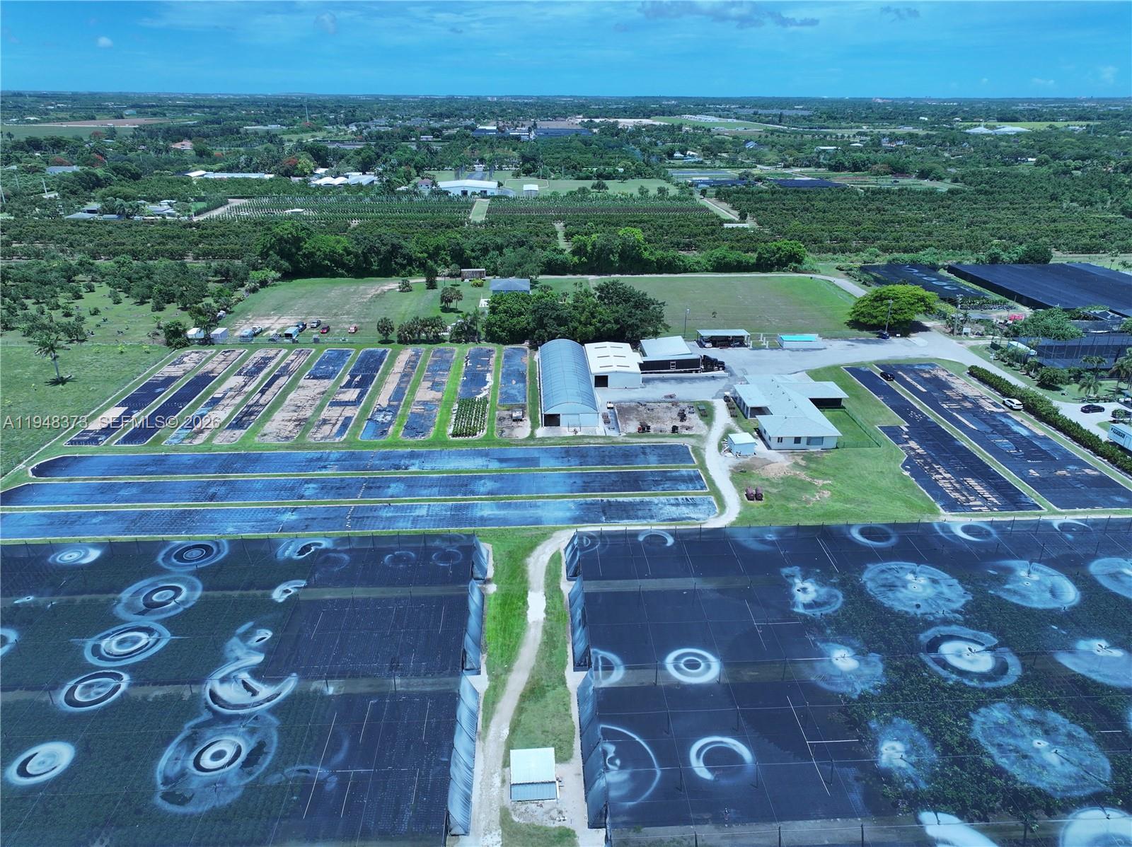 18455 Southwest 284th Street Homestead, FL 33030 - Photo 5 of 15 an aerial view of a house with a yard