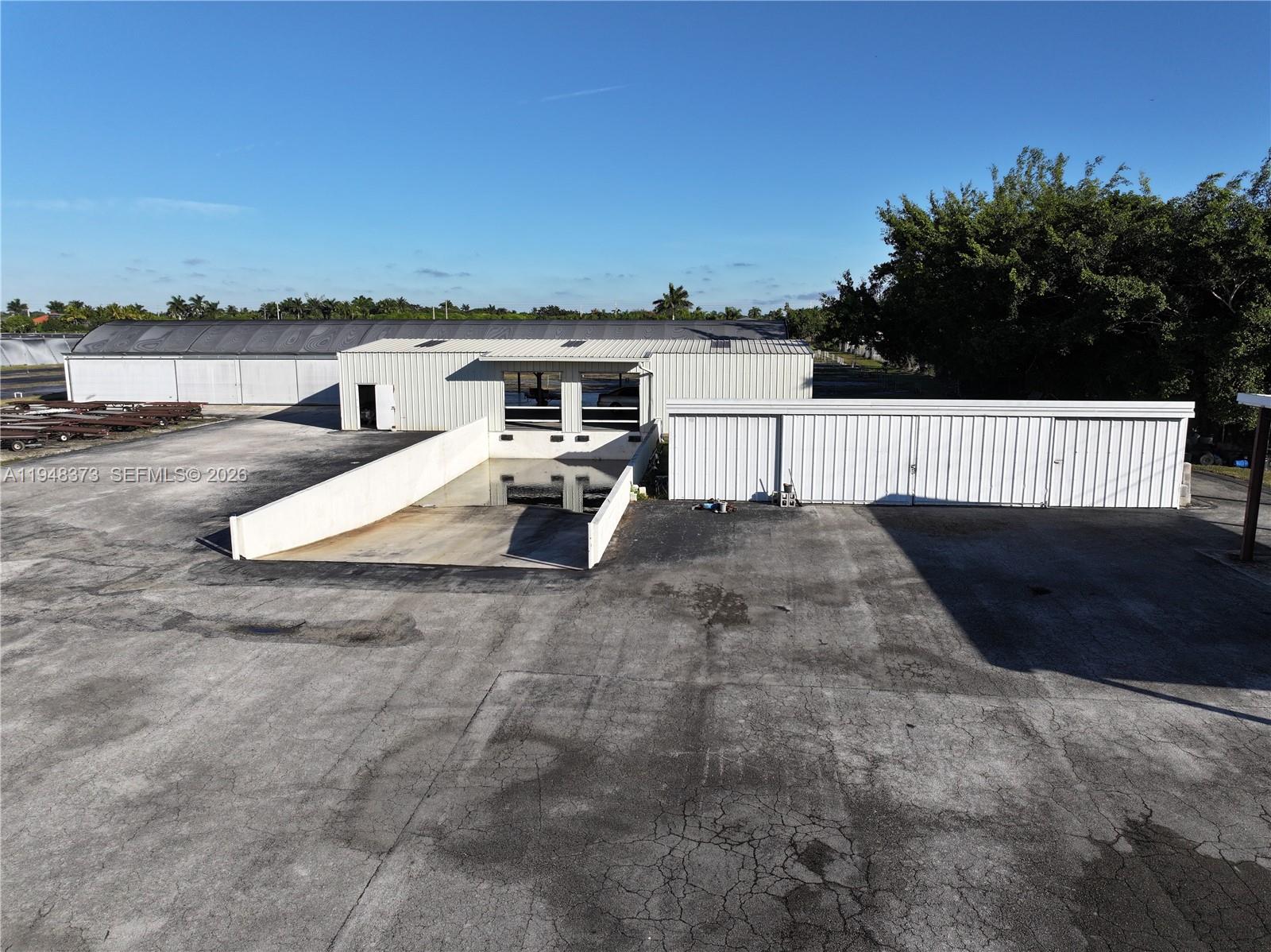 18455 Southwest 284th Street Homestead, FL 33030 - Photo 7 of 15 a view of balcony with city view