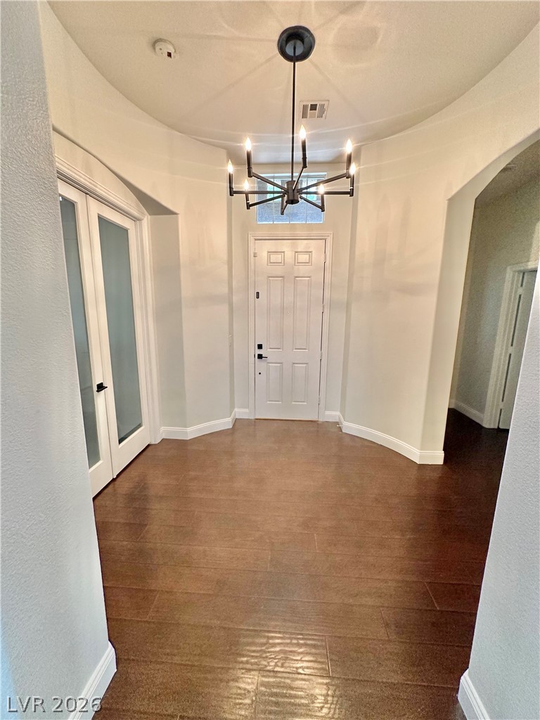 9996 Liberty View Road Las Vegas, NV 89148 - Photo 15 of 64 SPACIOUS FOYER WITH MODERN CHANDELIER
