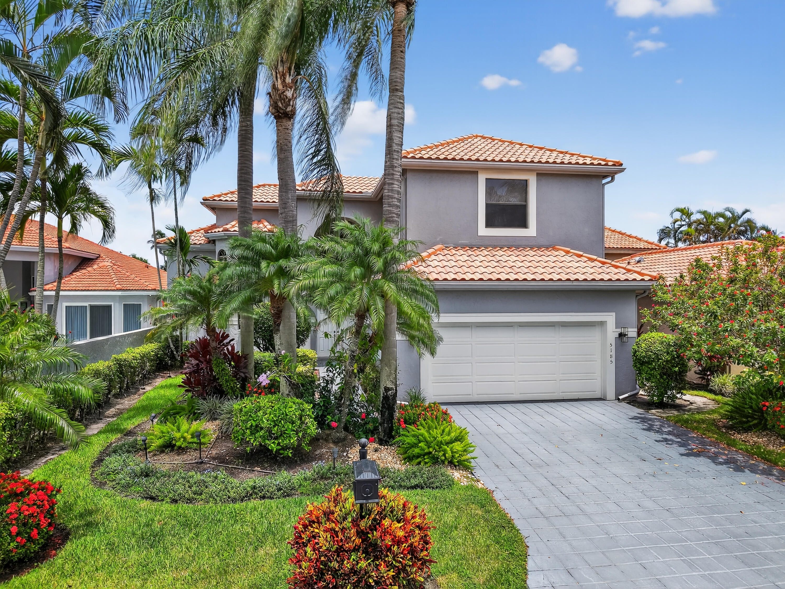 5185 Suffolk Drive Boca Raton, FL 33496 - Photo 1 of 49 DJI_20250731134423_0165_D