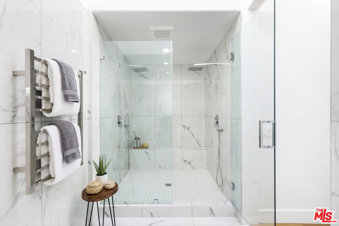 124 Roma Court Marina del Rey, CA 90292 - Photo 36 of 50 a bathroom with a tub shower and a sink