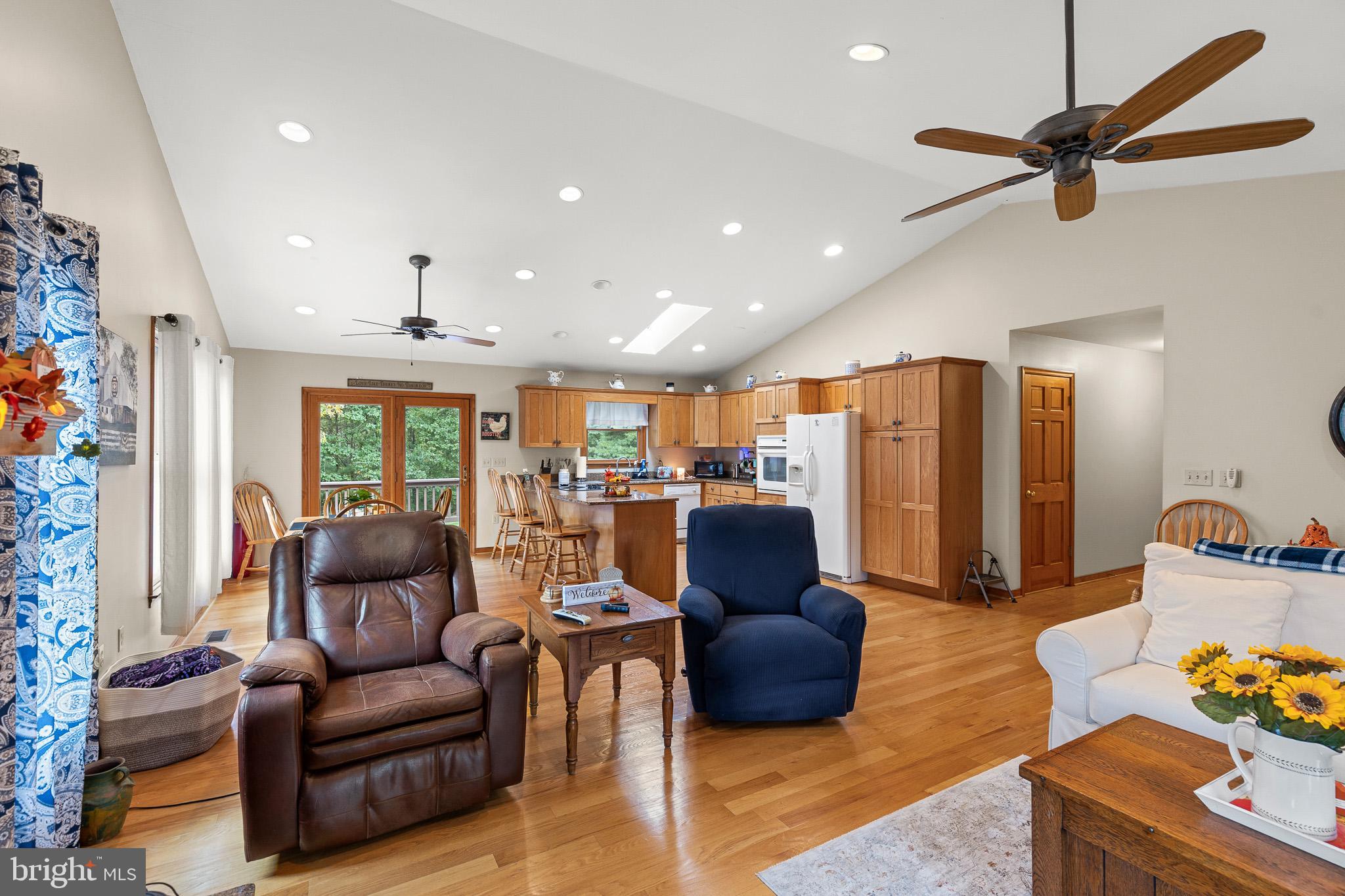 21246 Clarks Mountain Road Rapidan, VA 22733 - Photo 10 of 38 a living room with furniture and a large window