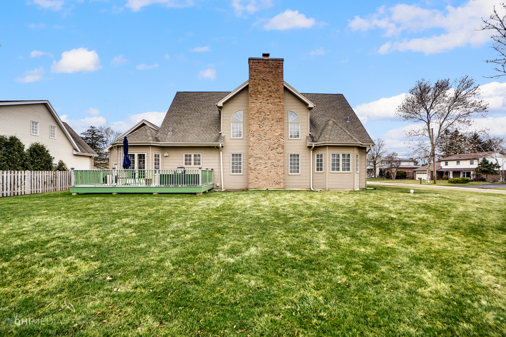 511 Russell Street Wheeling, IL 60090 - Photo 20 of 20 a front view of a house with a garden and yard