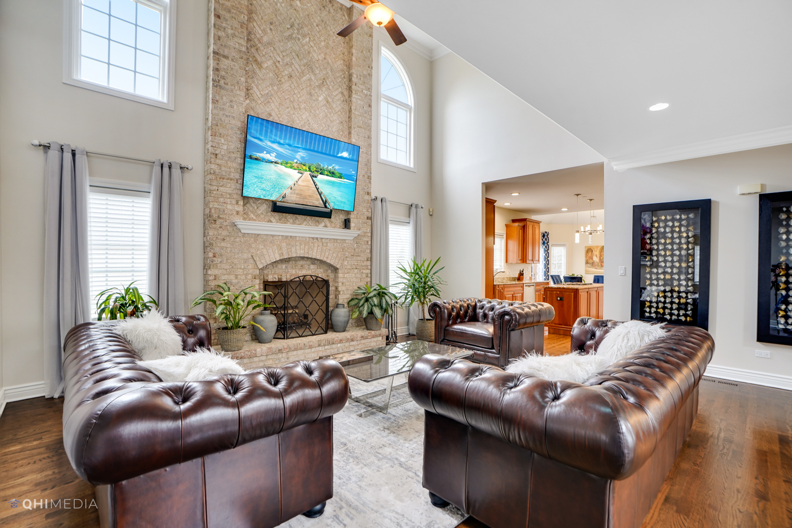 511 Russell Street Wheeling, IL 60090 - Photo 4 of 20 a living room with furniture a fireplace and a flat screen tv
