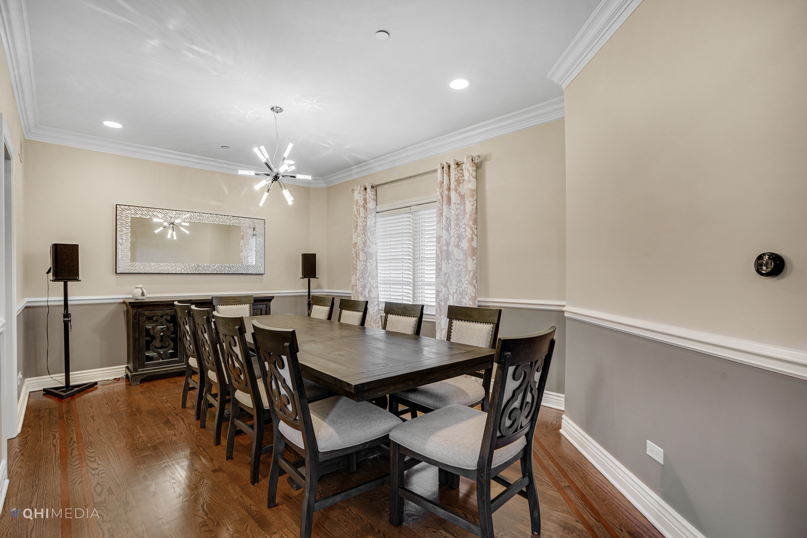 511 Russell Street Wheeling, IL 60090 - Photo 10 of 20 a view of a dining room with furniture and chandelier