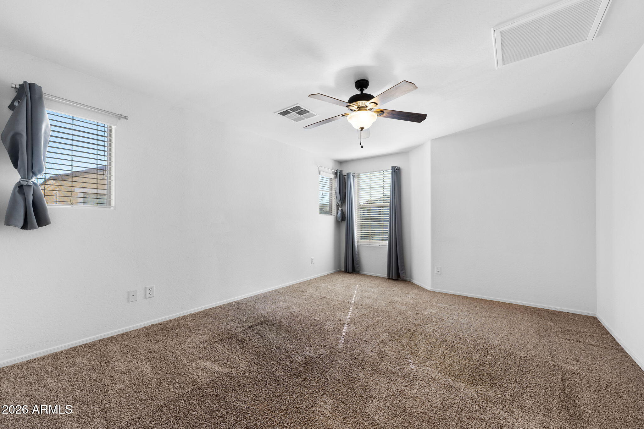 3500 East Milky Way Gilbert, AZ 85295 - Photo 13 of 23 a view of an empty room with a window