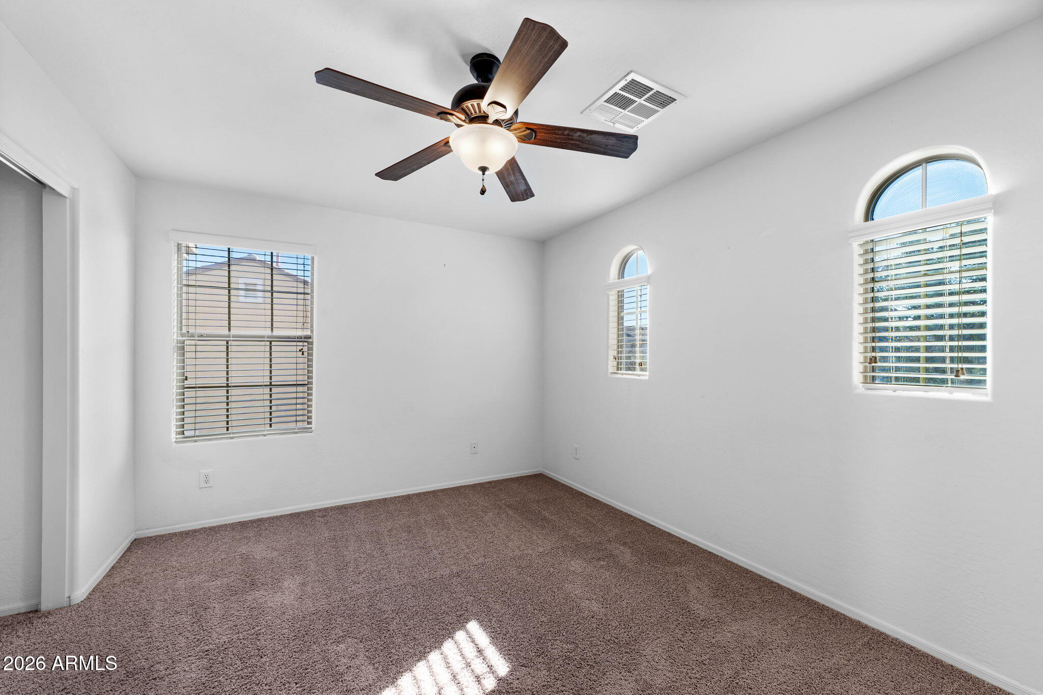 3500 East Milky Way Gilbert, AZ 85295 - Photo 16 of 23 a view of an empty room with a window