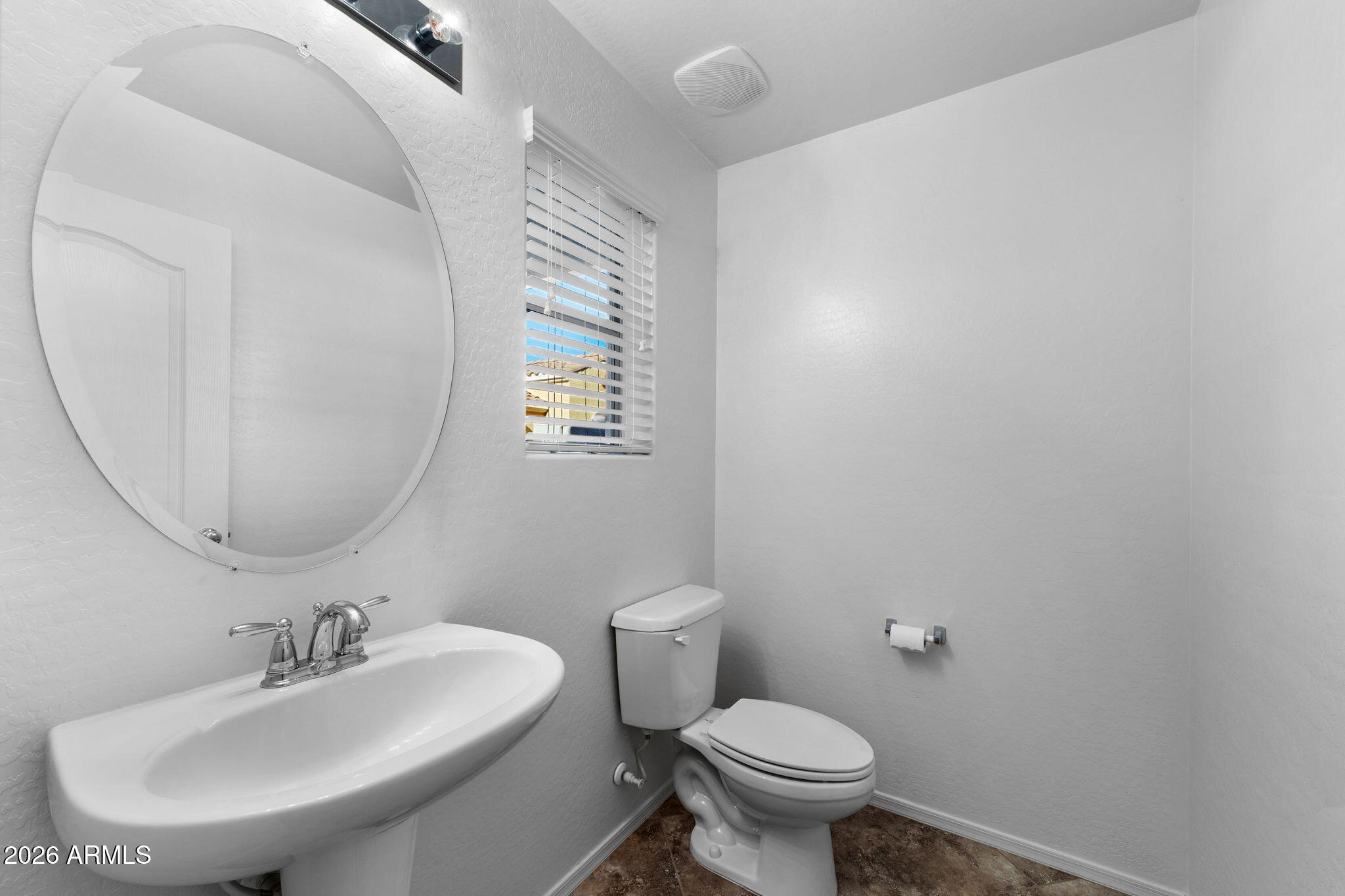 3500 East Milky Way Gilbert, AZ 85295 - Photo 18 of 23 a bathroom with a sink a toilet and a mirror