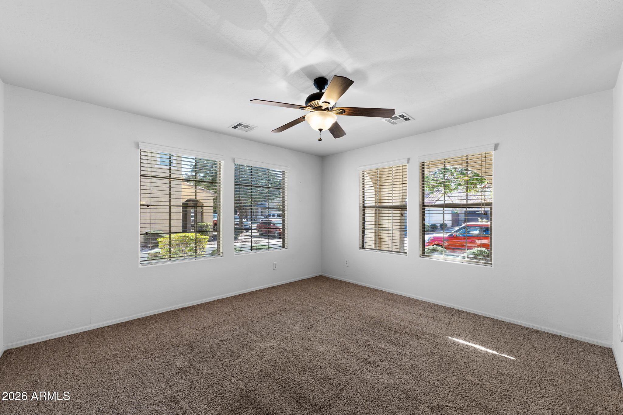 3500 East Milky Way Gilbert, AZ 85295 - Photo 4 of 23 a view of an empty room with a window