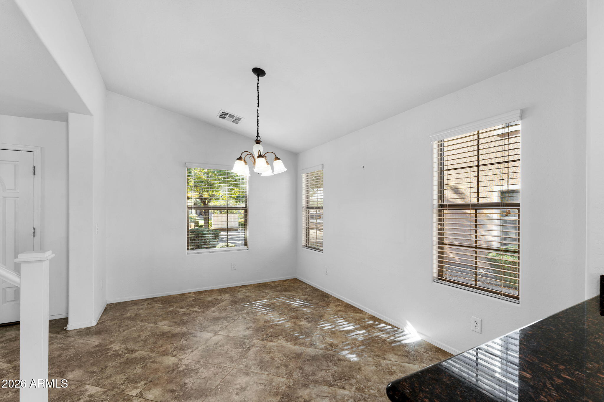 3500 East Milky Way Gilbert, AZ 85295 - Photo 6 of 23 a view of an empty room with a window