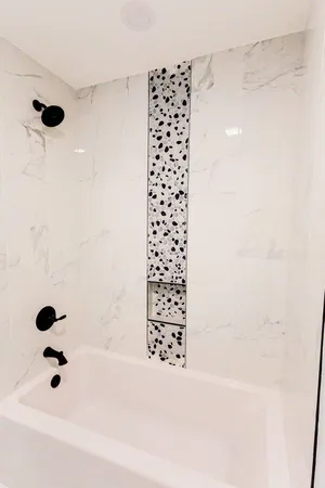 a bathroom with a bathtub