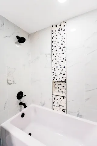 a bathroom with a bathtub