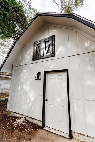 a view of a room with racks on the wall