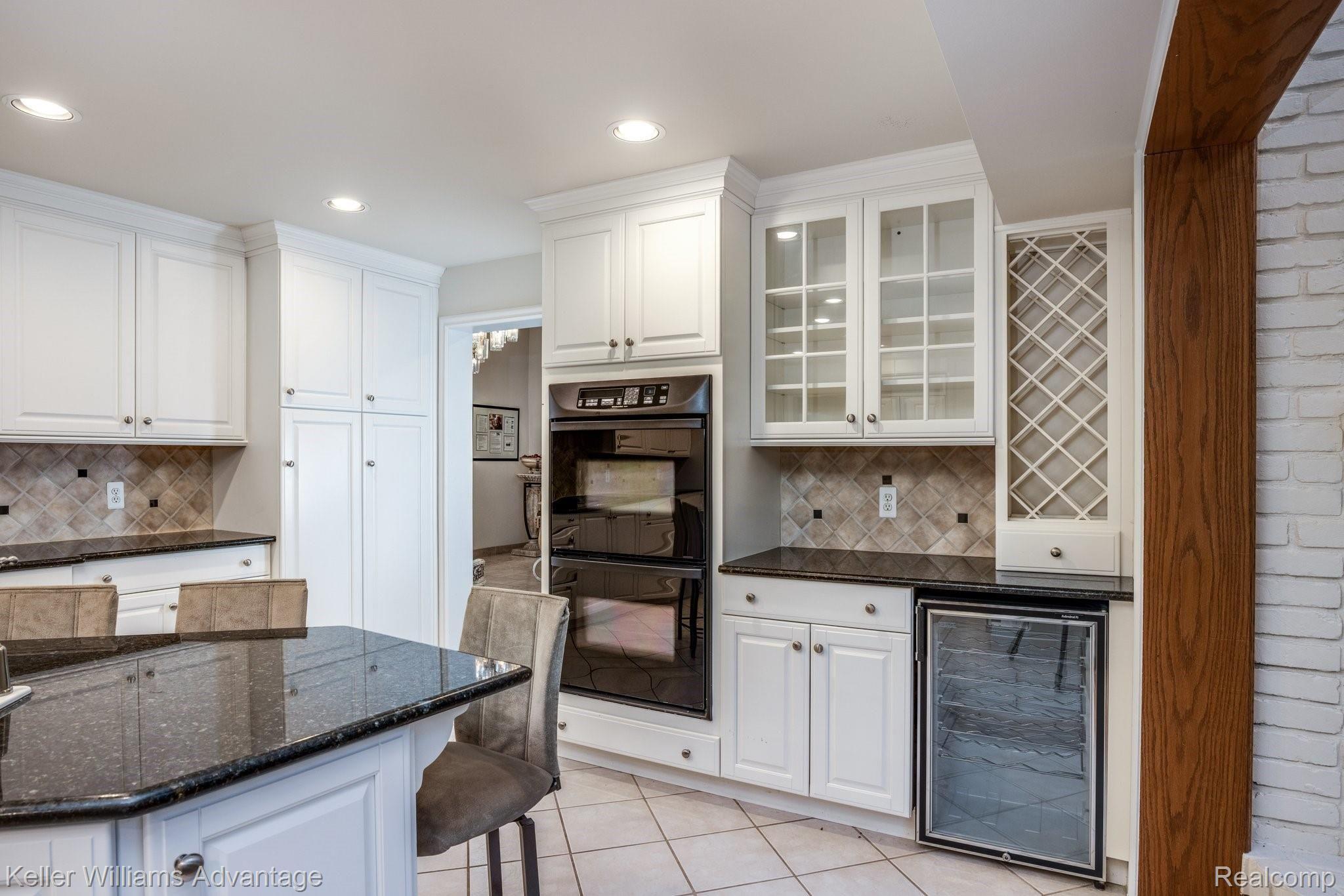 38125 Hayes Road Sterling Heights, MI 48313 - Photo 15 of 83 Double ovens, beverage cooler and wine rack