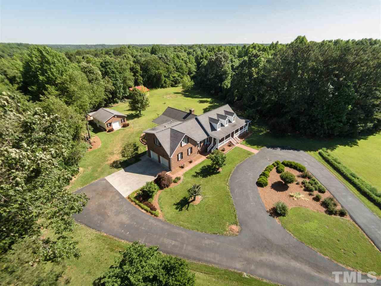 3128 Sanders Road Willow Spring, NC 27592 - Photo 23 of 25 an aerial view of a house with yard swimming pool and outdoor seating