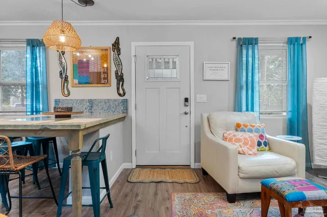 a living room with furniture and a table
