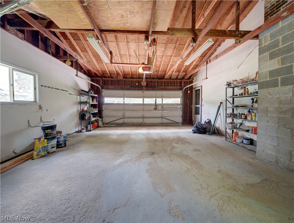11430 Ferry Road Chesterland, OH 44026 - Photo 24 of 38 Garage featuring a garage door opener