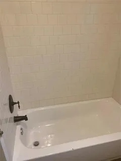 a bathroom with a bathtub