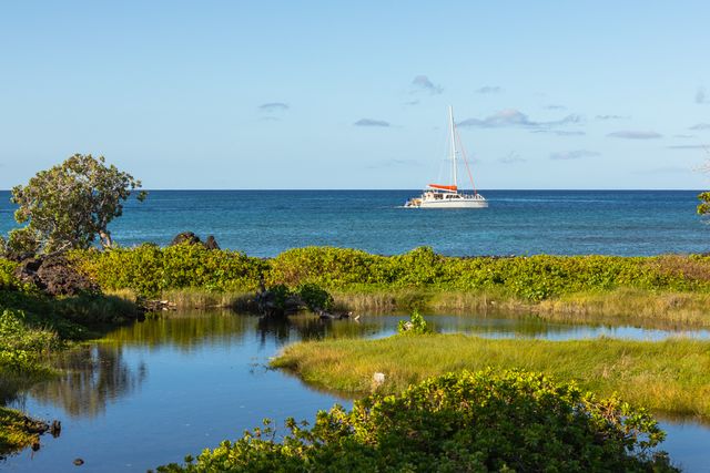 a large bathroom with a granite countertop tub sink and mirror