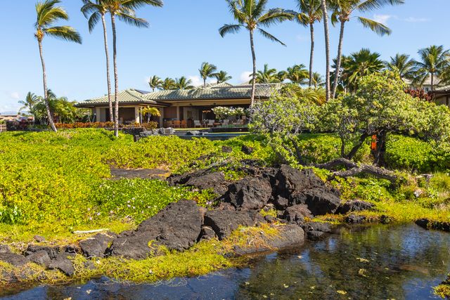 a view of a pathway with a yard