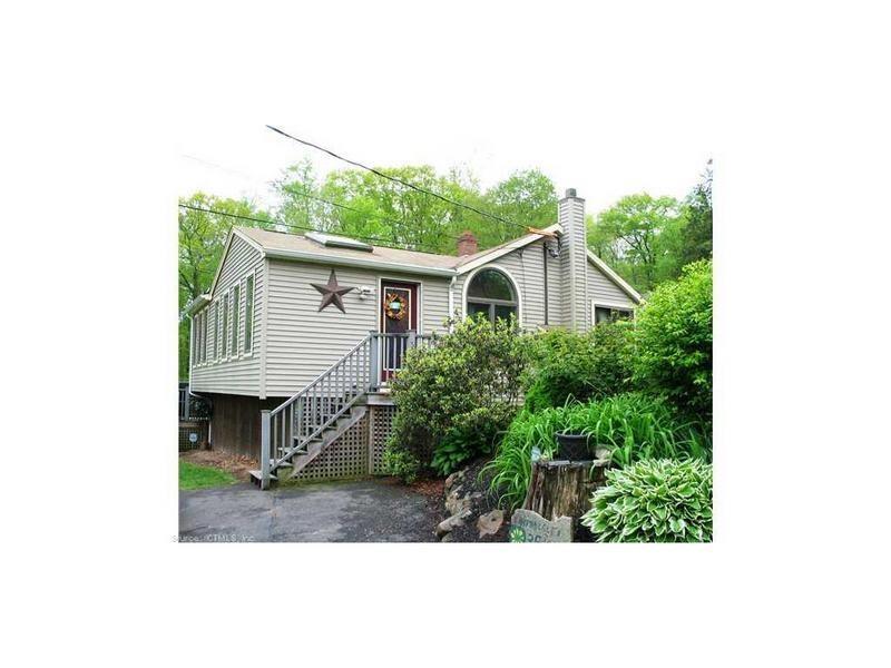 35 Chipeway Road Middlefield, CT 06455 - Photo 1 of 1 a front view of a house with a yard