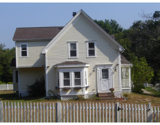 42 Marion Road Middleboro, MA 02346 - Photo 1 of 29 a front view of a house with a garden