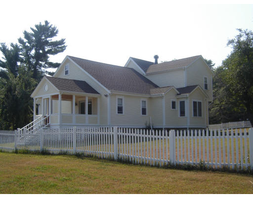 42 Marion Road Middleboro, MA 02346 - Photo 28 of 29 a front view of a house with a yard