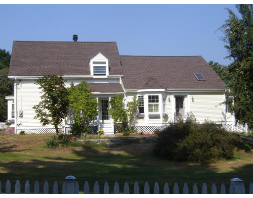 42 Marion Road Middleboro, MA 02346 - Photo 3 of 29 a front view of a house with a yard