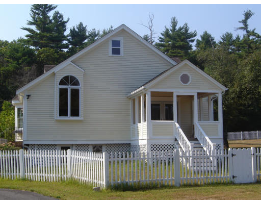 42 Marion Road Middleboro, MA 02346 - Photo 4 of 29 a front view of a house with a yard