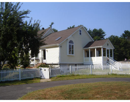 42 Marion Road Middleboro, MA 02346 - Photo 5 of 29 a front view of a house with a yard