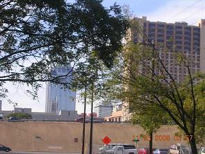 907 East 3rd Street Austin, TX 78702 - Photo 1 of 2 Urban skyline views frame this potential development lot.