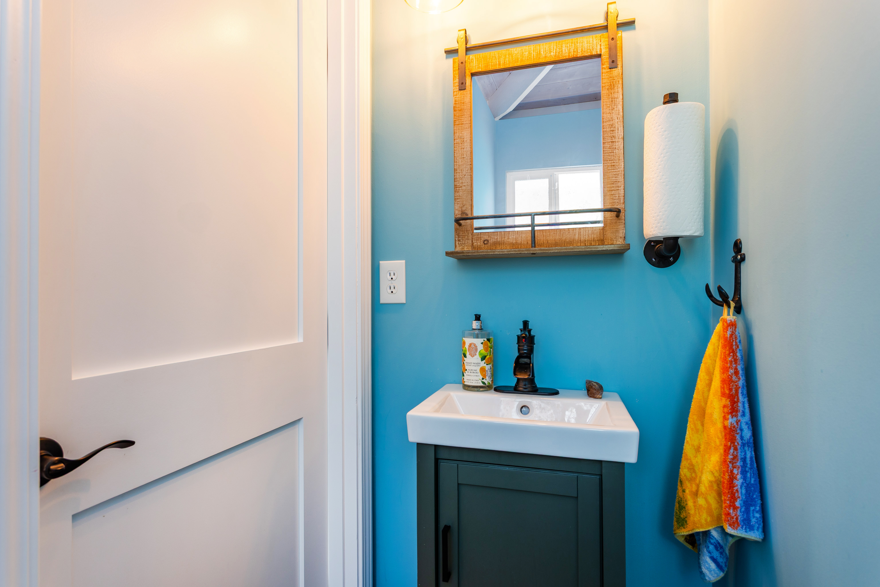 89-780 Huanui Road Captain Cook, HI 96704 - Photo 25 of 30 a bathroom with a sink and a mirror