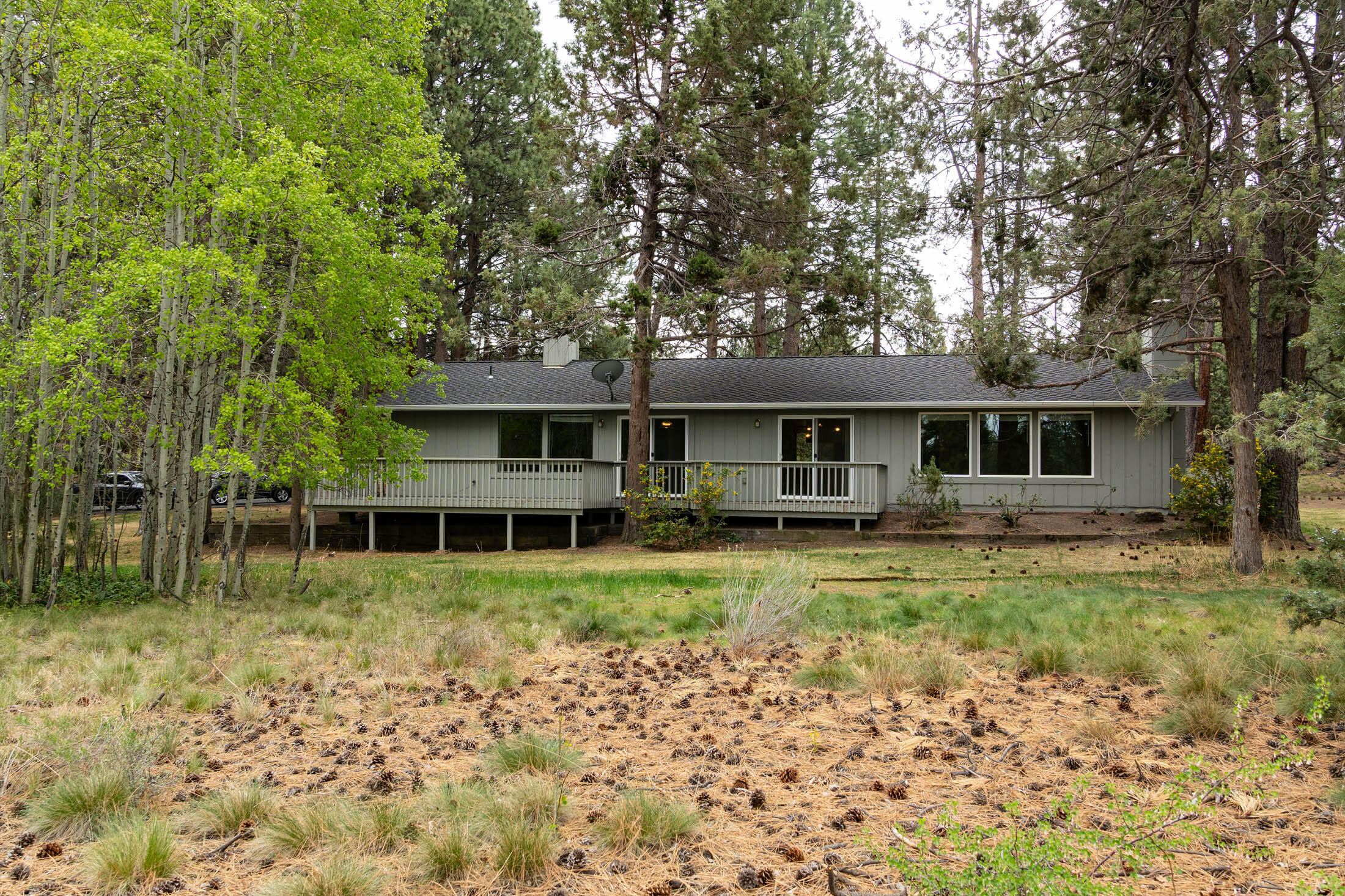 20316 Donkey Sled Road Bend, OR 97702 - Photo 32 of 50 a front view of a house with garden