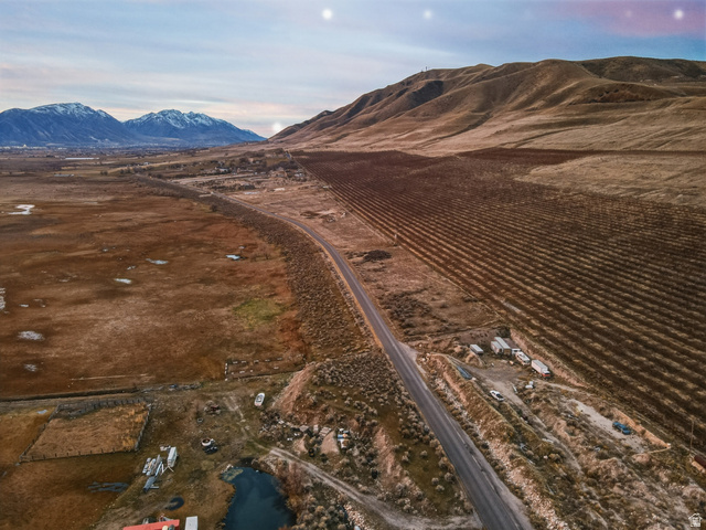 5952 South Lincoln Road Spanish Fork, UT 84660 - Photo 8 of 15 Aerial overview of property's location featuring rural landscape and a mountainous background