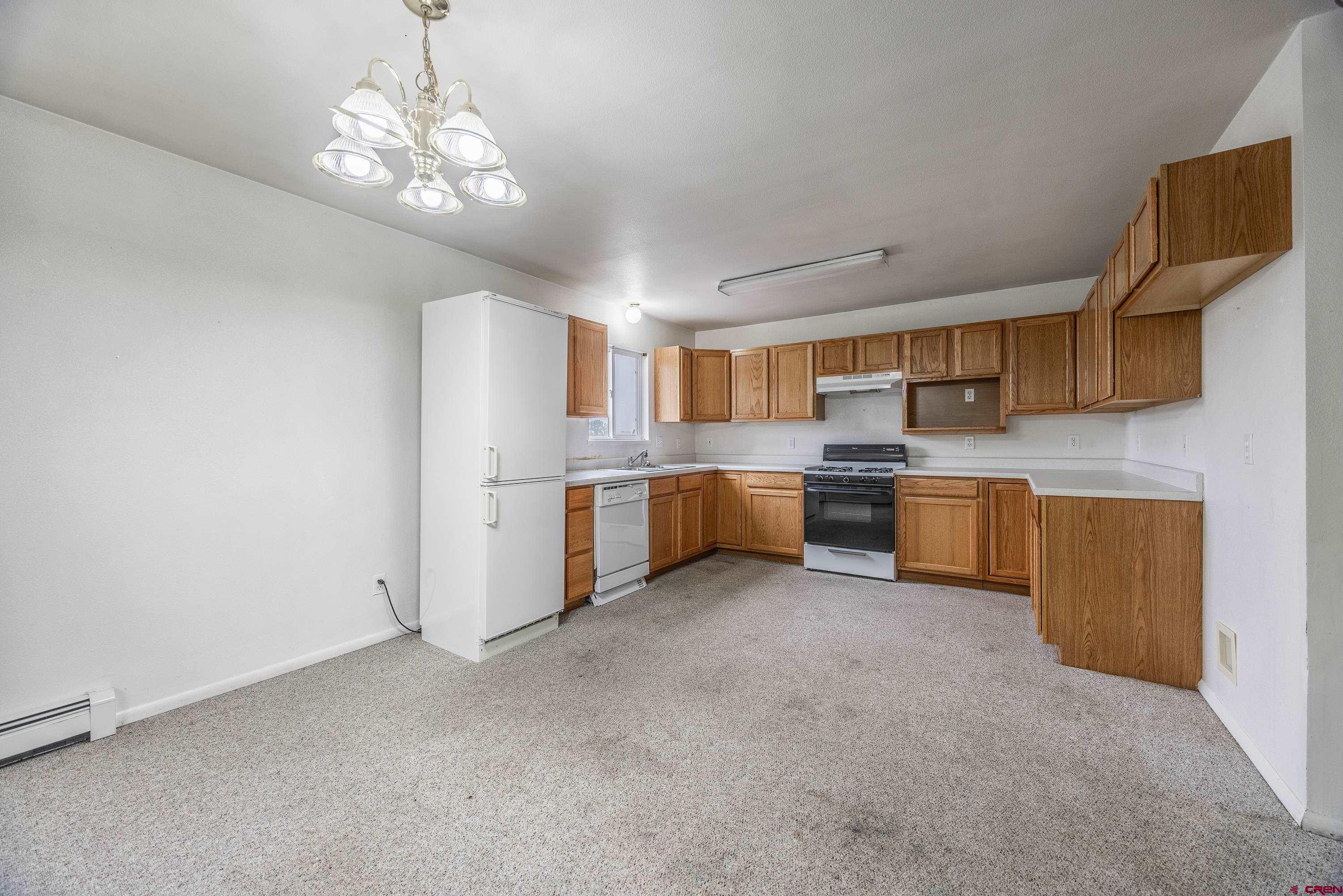 17377 Breeze Road Delta, CO 81416 - Photo 10 of 45 a kitchen with a sink and cabinets
