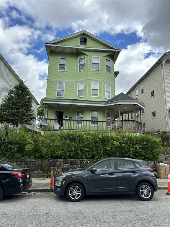 15 Blanche Street Worcester, MA 01604 - Photo 1 of 1 a front view of a house with car parked