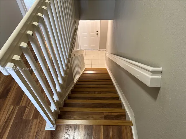a view of entryway with wooden floor