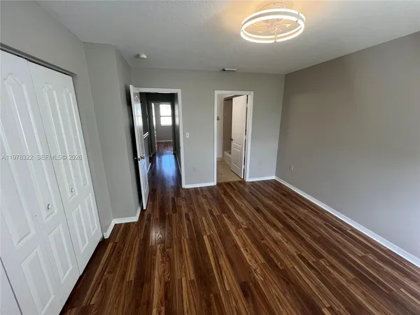 a bathroom with a tub and a sink