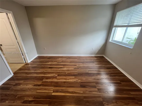 a bathroom with a shower and a bathtub