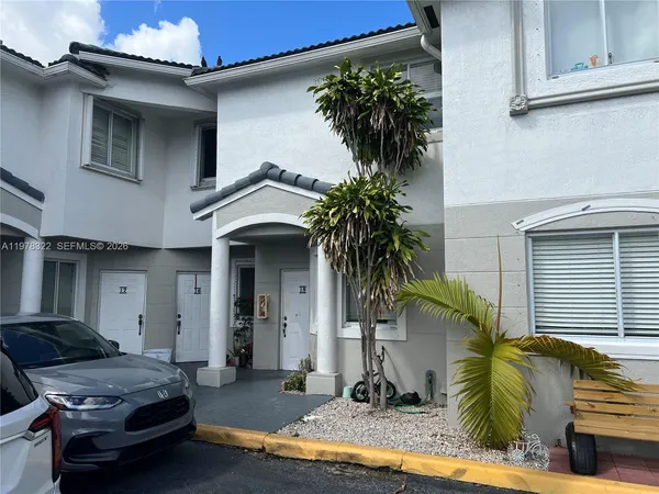 a view of a house with a patio