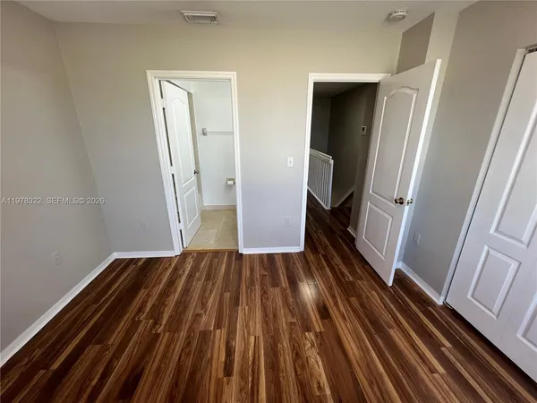 a bathroom with a white bath tub