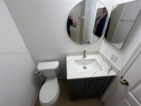 a view of backyard with a potted plant