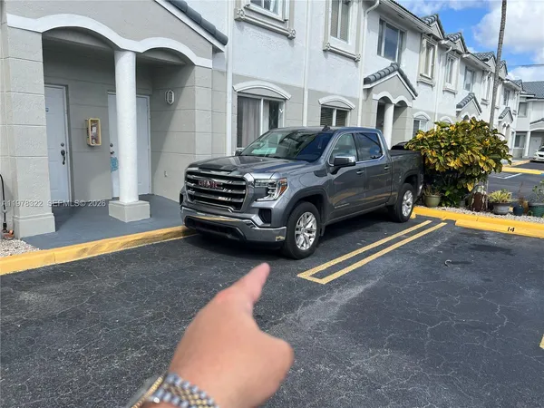 a car parked in front of a house